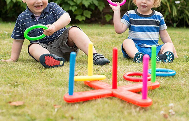 grandkids playing with the ring toss game set