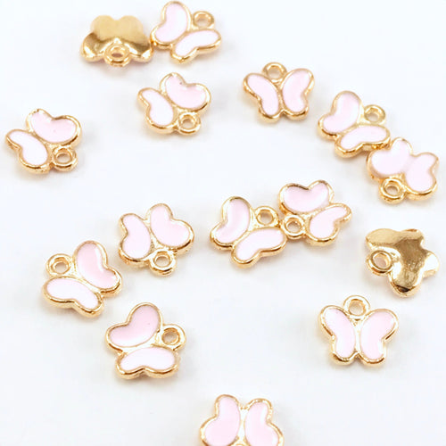 pink and gold butterfly shaped jewelry charms
