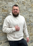 Co-founder Tony wearing SUAVE OWL hoodie in cream.