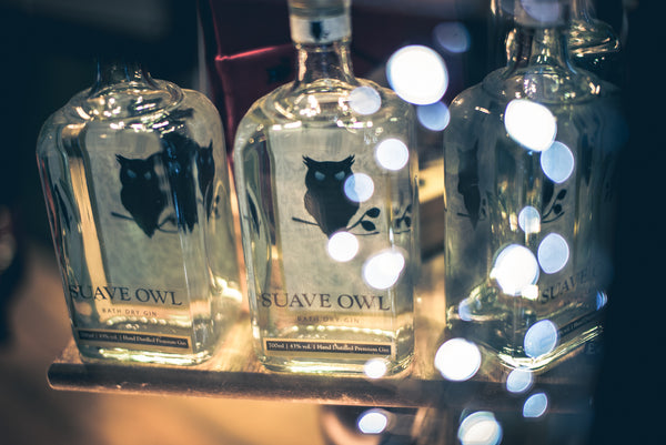 SUAVE OWL Gin pictured with lights