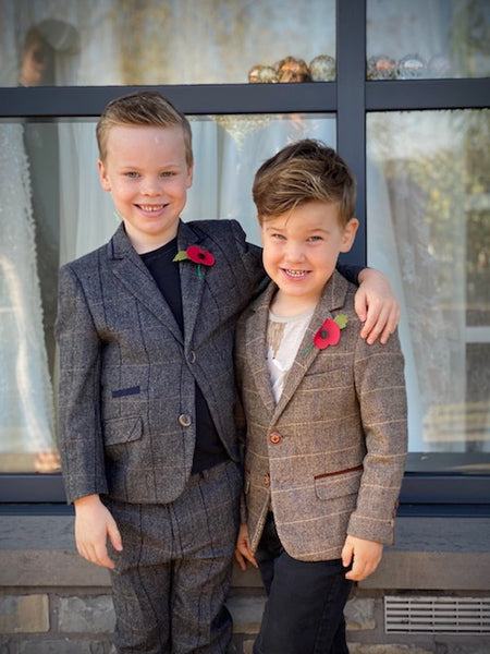 Co-founder Tony and Jessica's sons, photographed both wearing poppies.