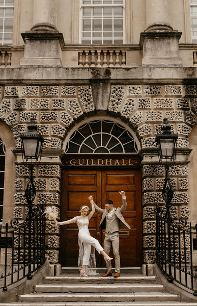 Guildhall wedding venue in Bath - bride and groom outside Guildhall Bath