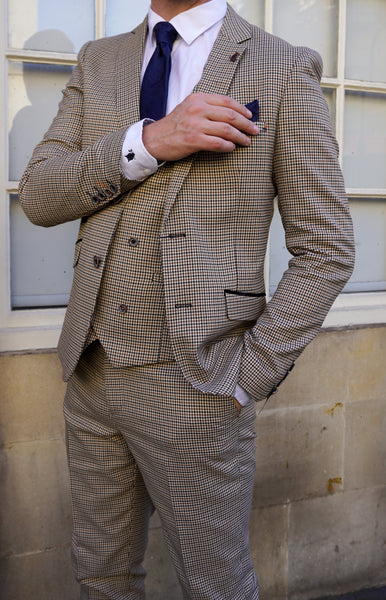 Cream suit for men, the Elwood, worn by model.