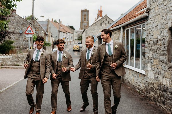 Groom's party wearing Ted brown suit for men.