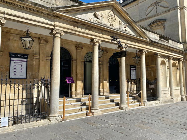 A pump rooms entrance in central Bath which leads to the Roman Baths.