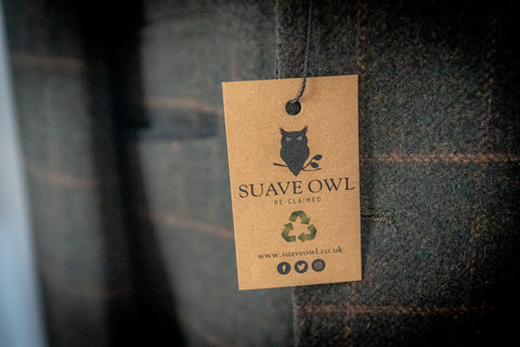 SUAVE OWL Reclaimed logo on men's suit.
