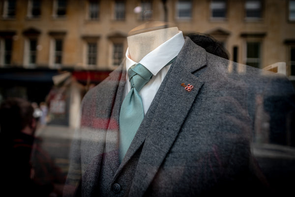 Suit in shop window.