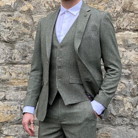 Sage suit for men worn by model.