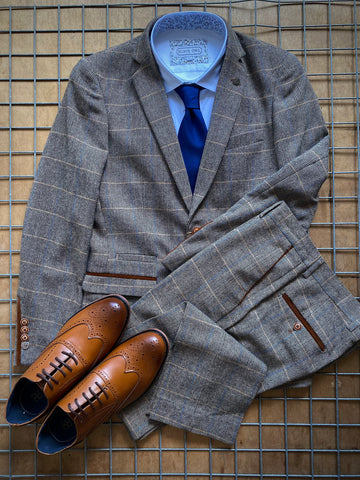 Full Ted laid out on grid. Brown suit for men.