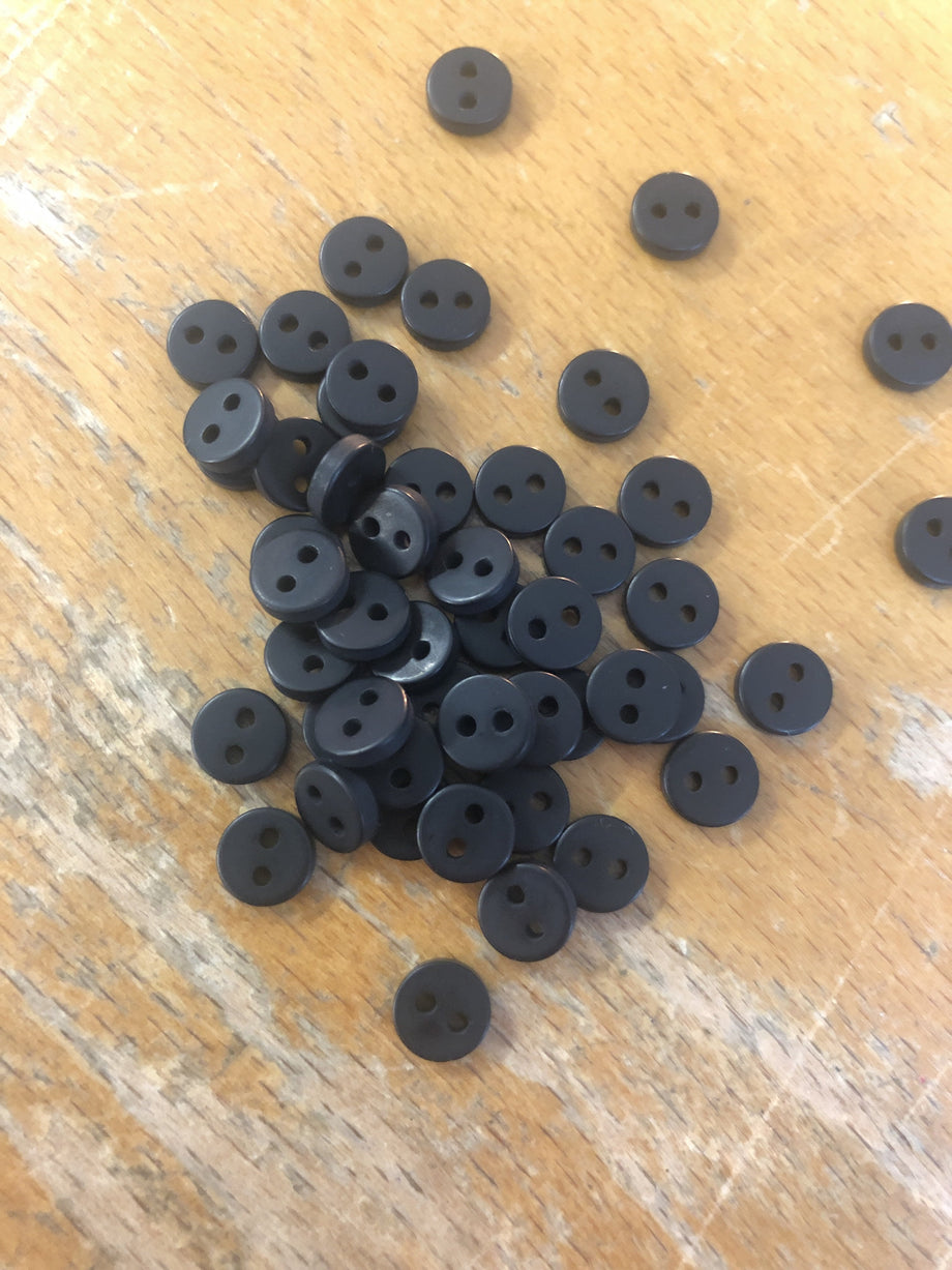 small black buttons