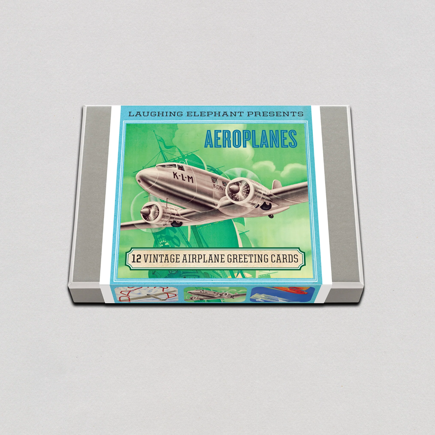 A photo of Laughing Elephant's Aeroplanes Boxed Greeting Cards with a vintage airplane on the cover