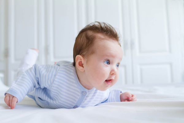 Smiling baby tummy time