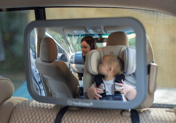 driving mother checking on her baby using KeaBabies Car Seat Mirror