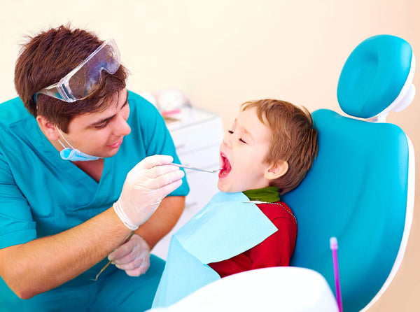 Small kid, patient visiting specialist in dental clinic