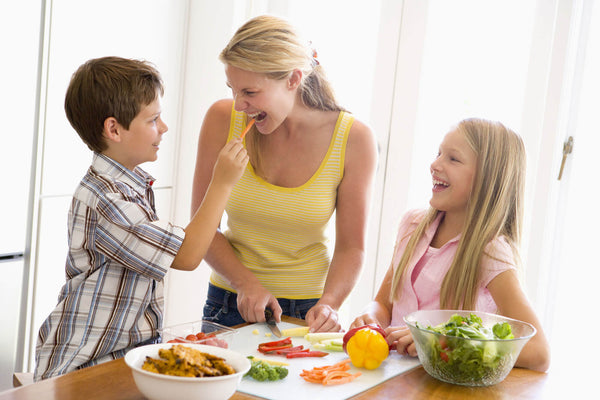 Mother Children Prepare Meal Mealtime Together