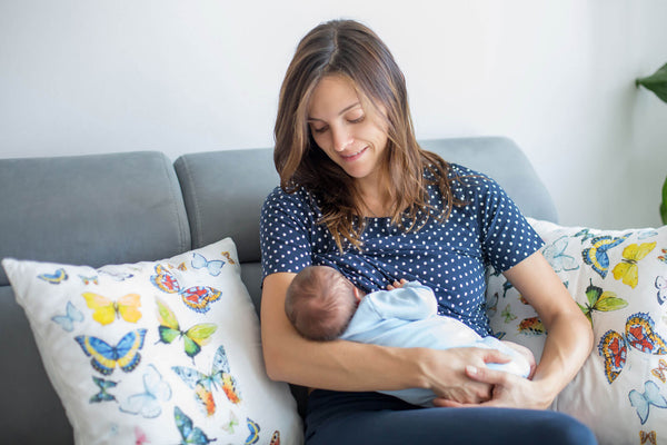 mother breastfeeding her baby