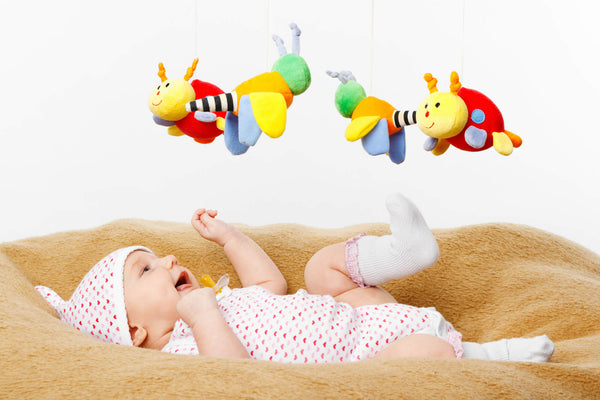 Happy smiling Baby Playing with toys