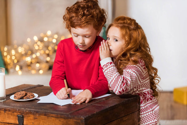 Kids writing wish list for Santa