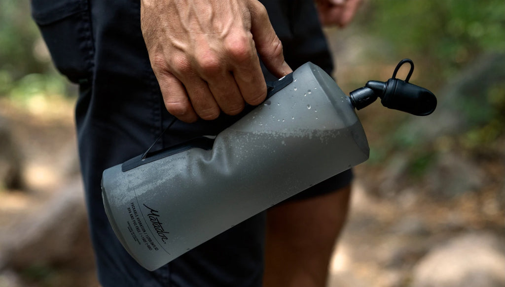 holding packable water bottle