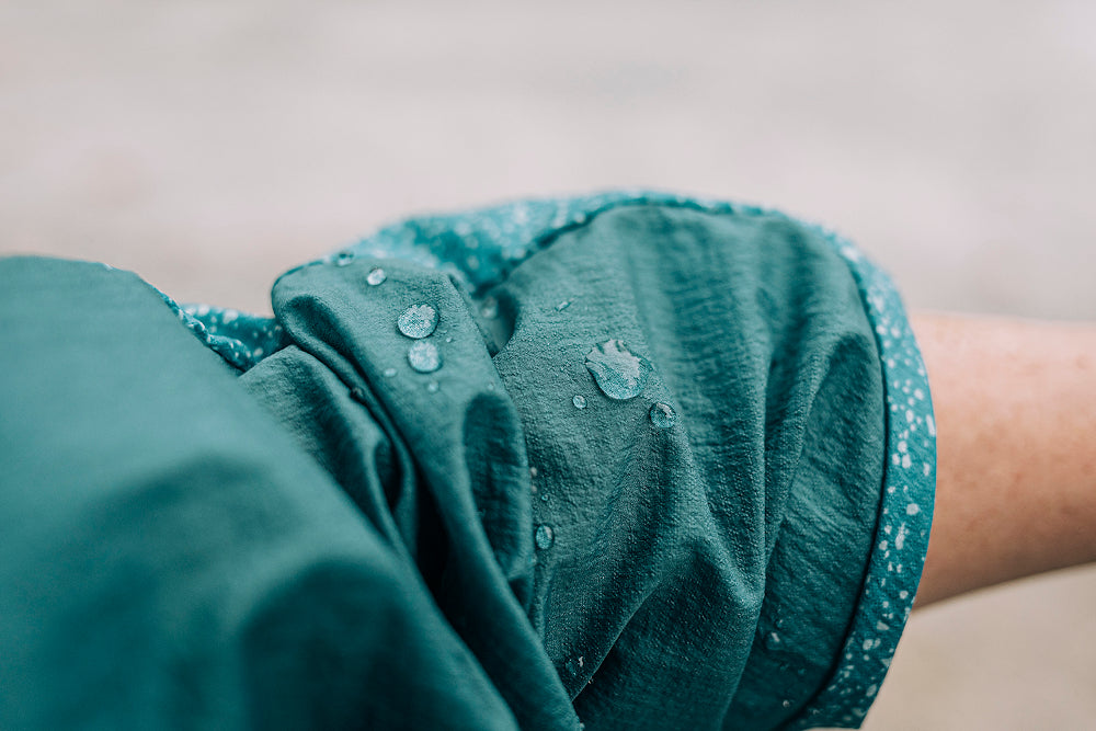 water beads on a jacket sleeve