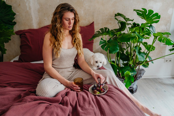  Woman sitting on bed