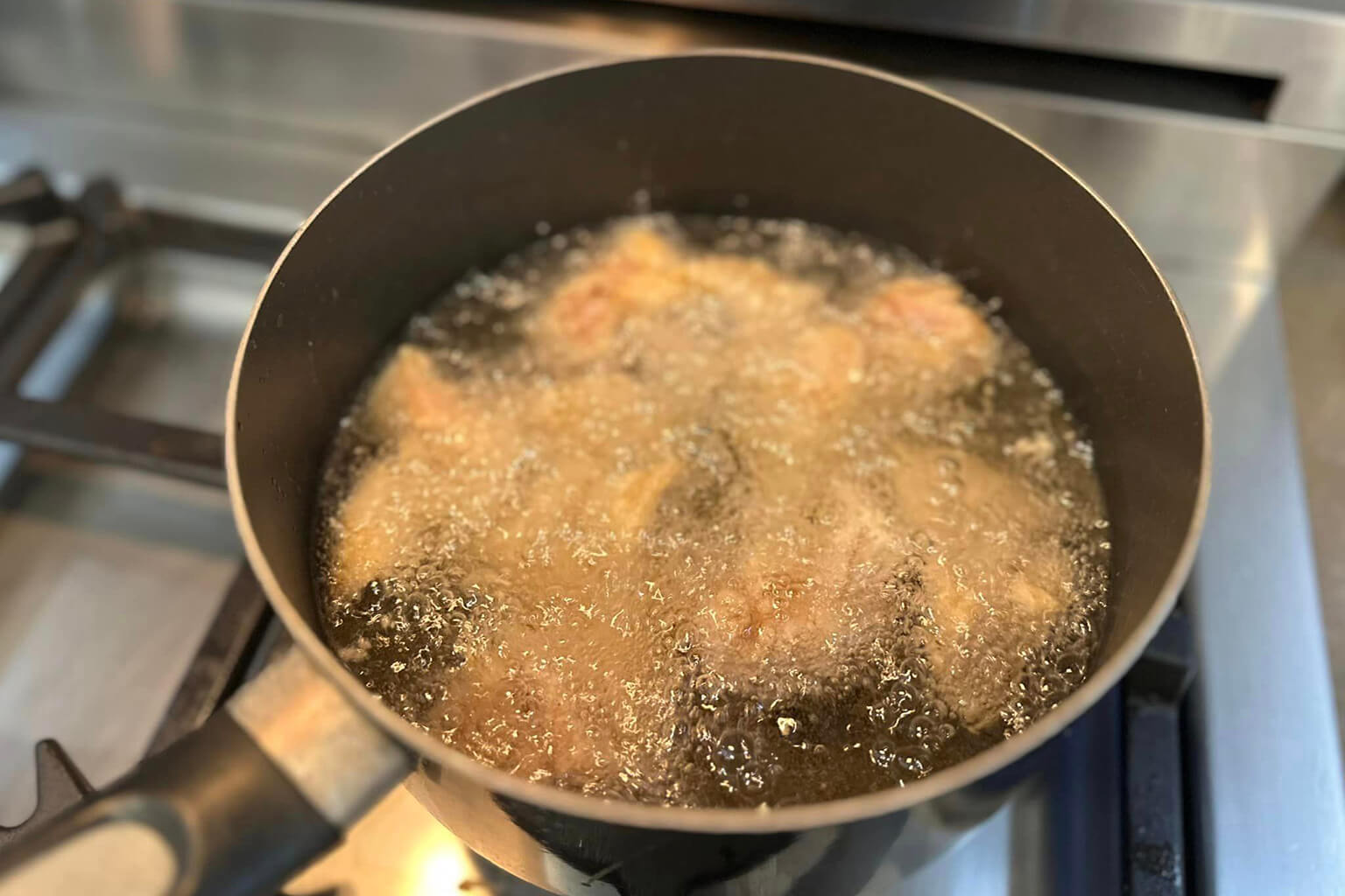 Remove excess powder and fry with medium heat until golden.