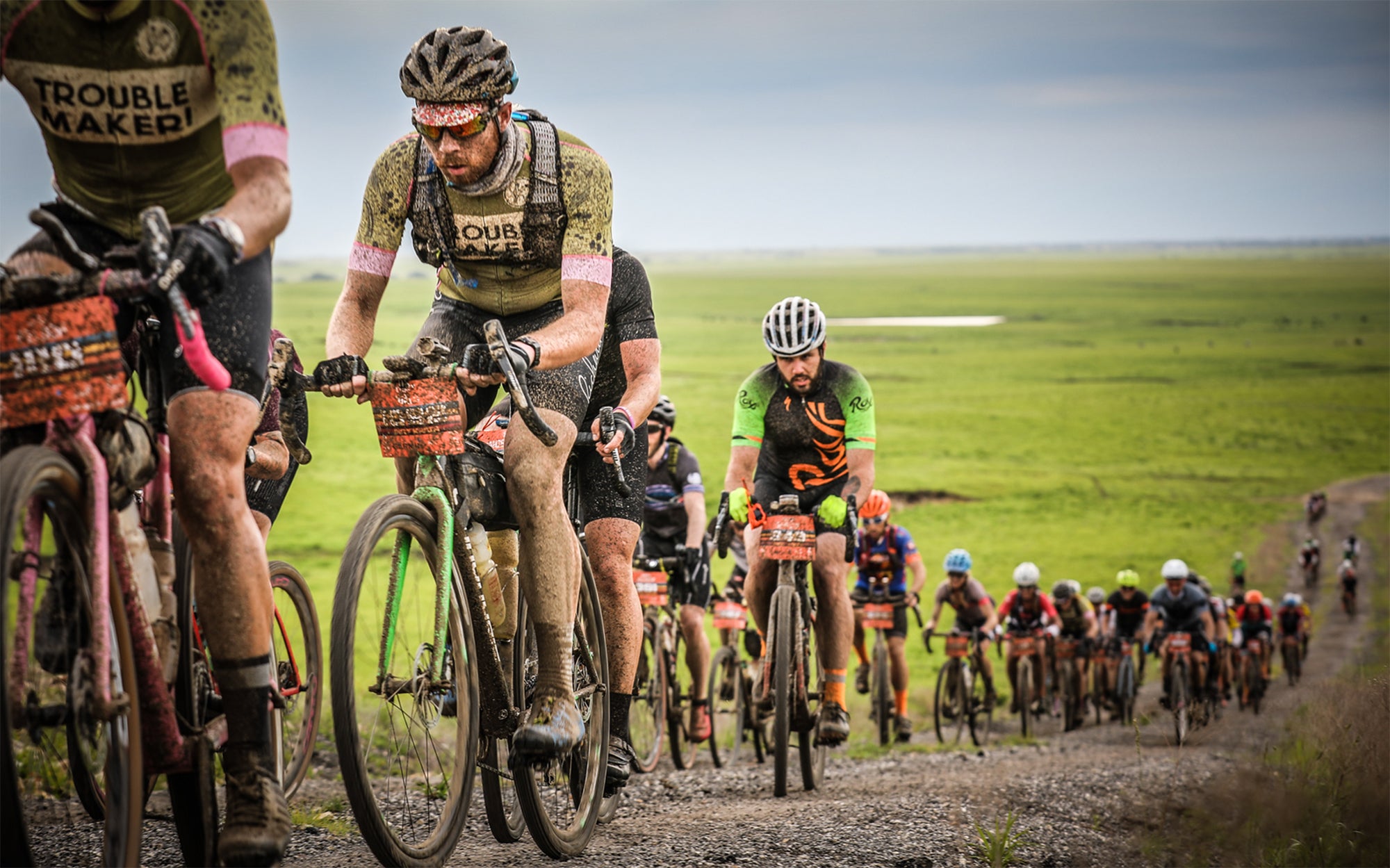 The Dirty Kanza peloton covered in mud