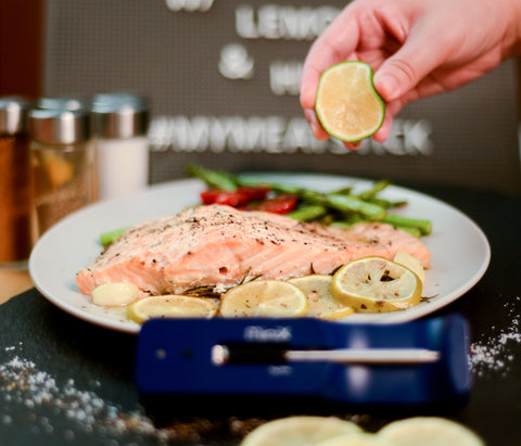 Lemon drizzled over salmon with The Mini