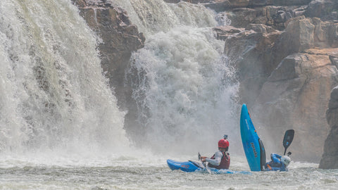 Paddlers who had just dropped down this waterfall. Credit: Kalob Grady