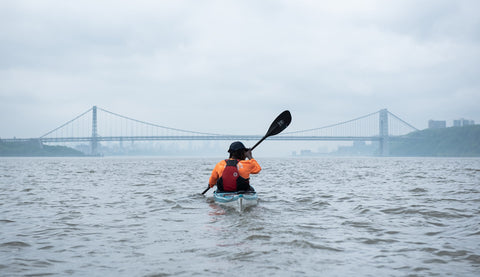 Chev Dixon paddling with the Cyprus paddle in New York