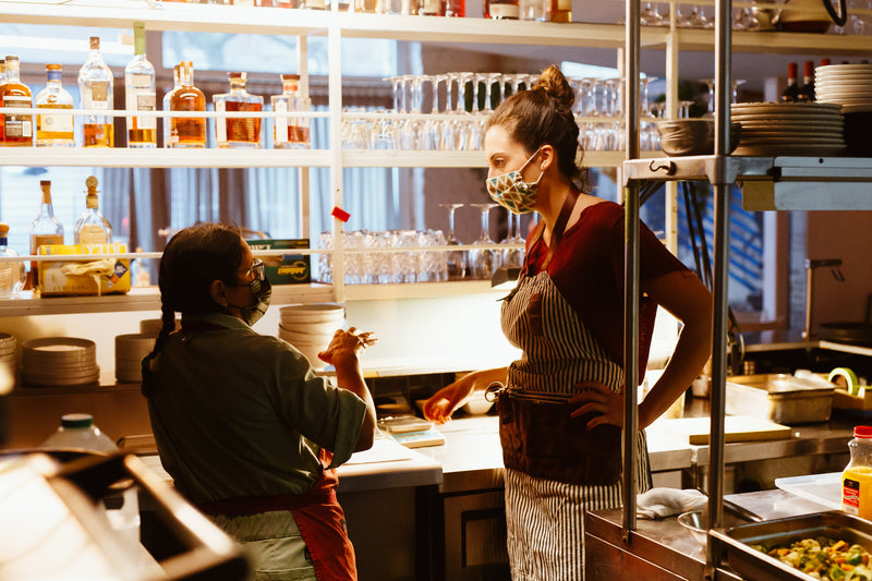 chef einat admony and christine cooking together at Balaboosta