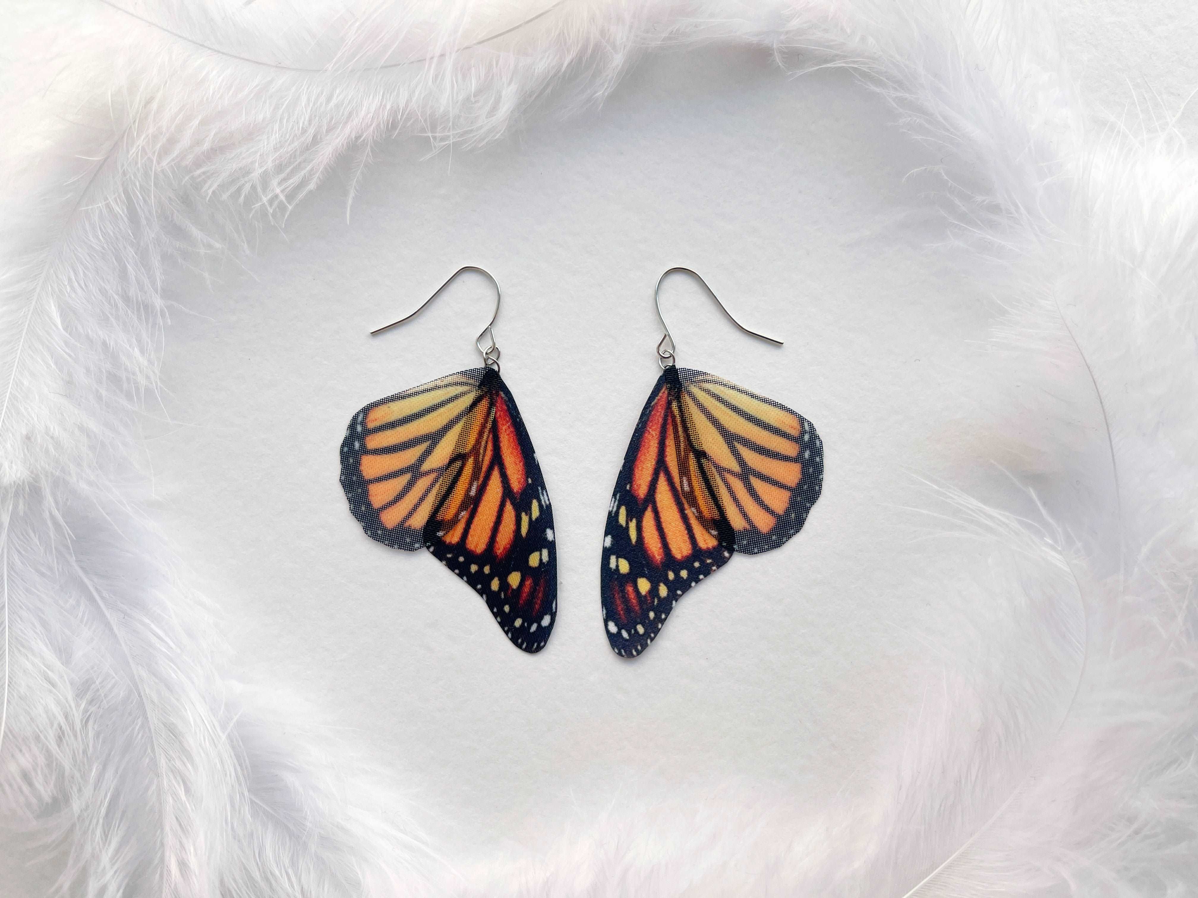 African Monarch Butterfly Wing Earrings by KristenJarvisART on DeviantArt