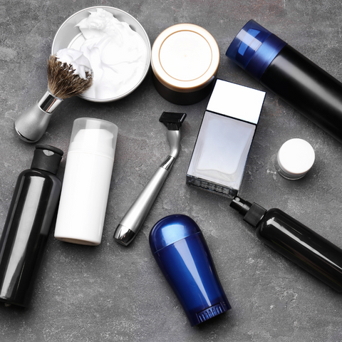 plastic cosmetic bottles and a razor