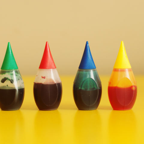 small bottles of colored liquids