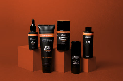 mends products in black products on orangeish background