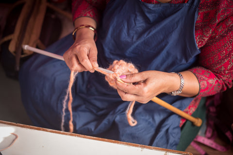 Knitting Hands of Nepalese Woman