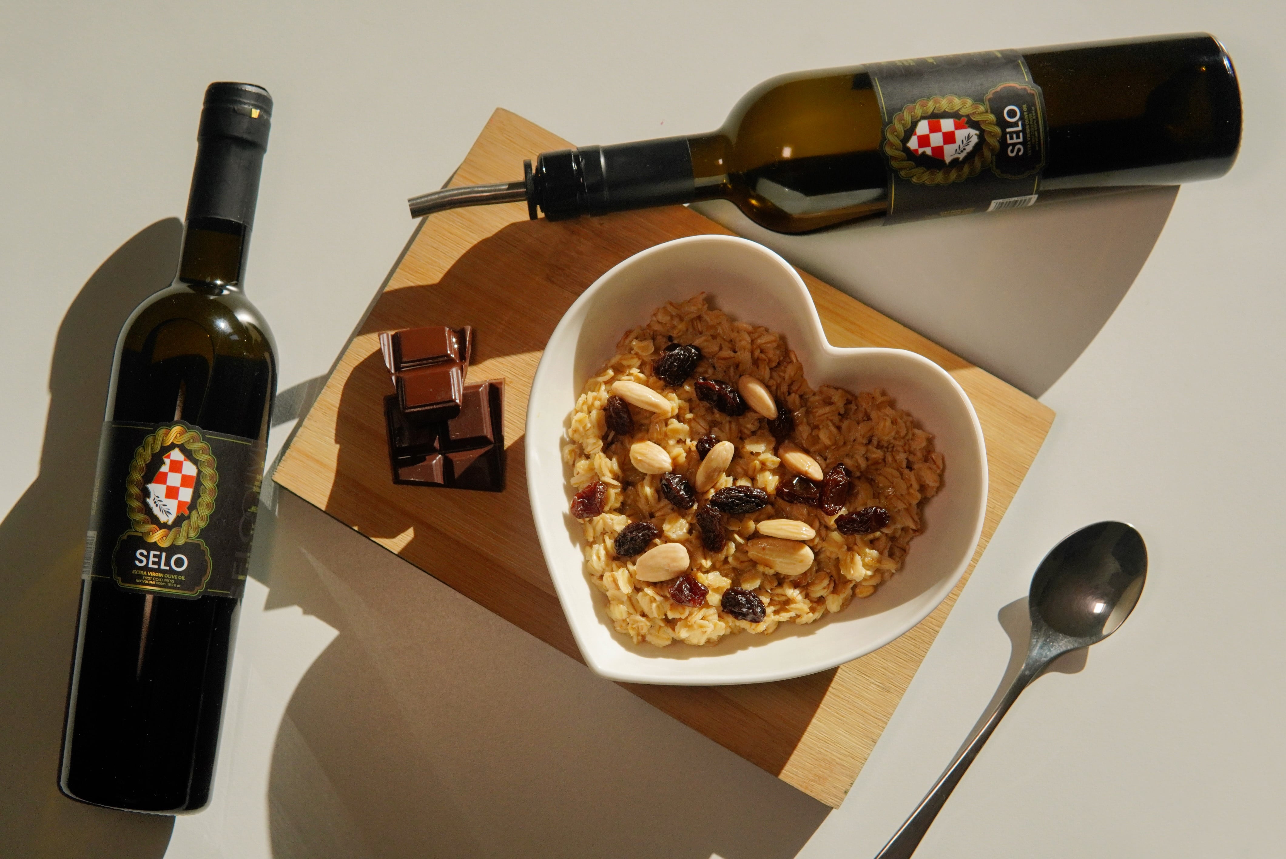 Selo Croatian olive oil paired with a delightful combination of granola and dark chocolate.