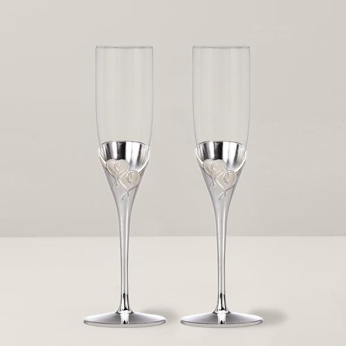 Champagne toast. Two filled champagne flutes touch in a spill over toast ,  #AFF, #filled, #toast, #Champagne, #champagne, #s…