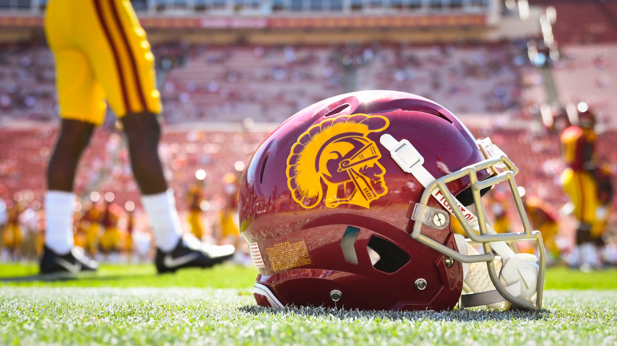 USC Trojans football helmet on the field at LA Memorial Coliseum