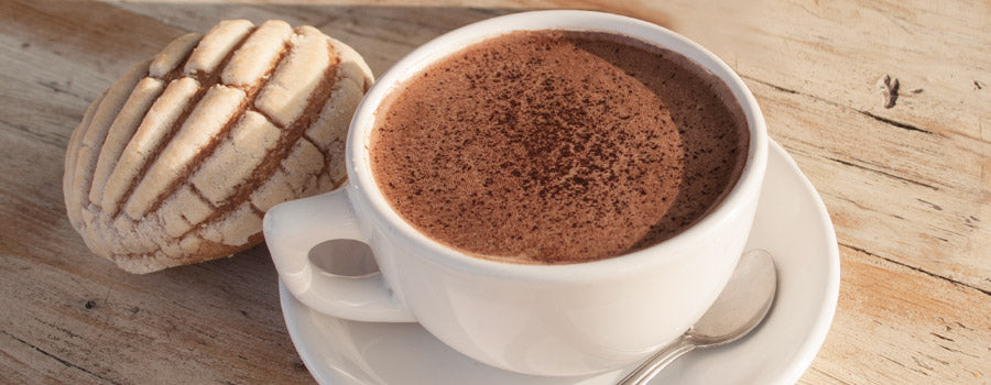 hot chocolate in mug with concha 