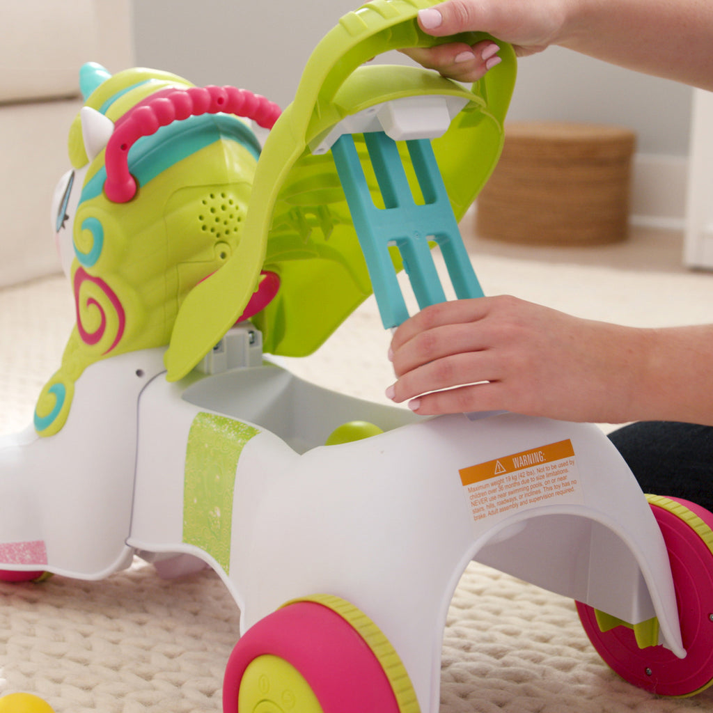 smilin shimmer 3 in 1 sit walk and ride unicorn