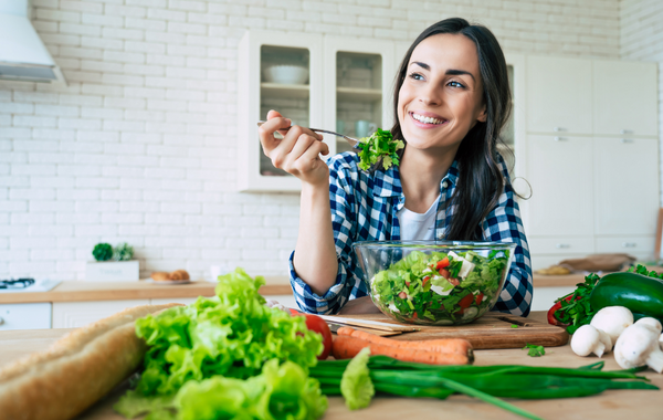 Woman eating a healthy looking meal