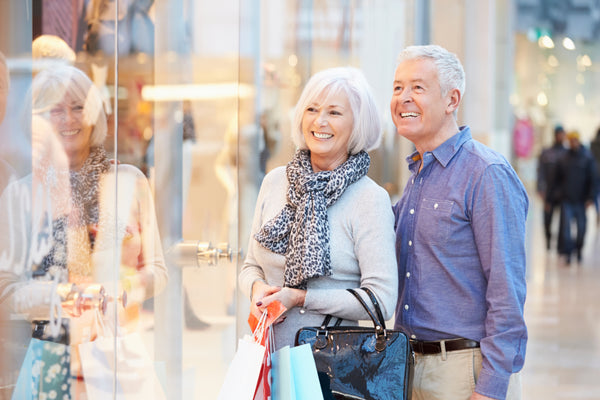 Happy couple together at a shopping mall