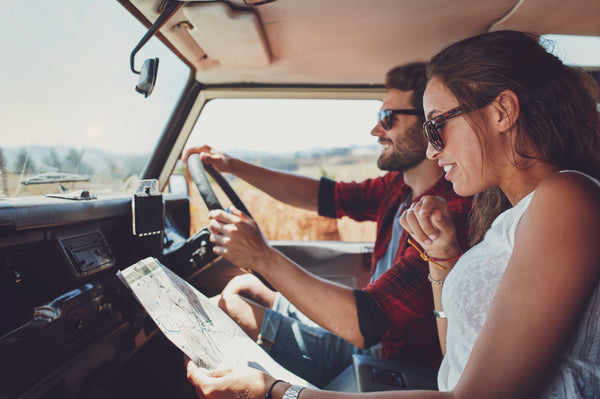 Couple in a car on a road trip