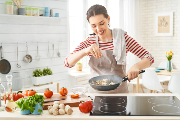 Woman cooking healthy meal