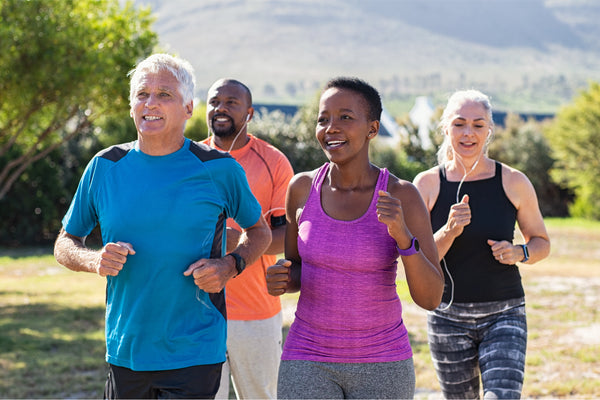 Group of people jogging outside