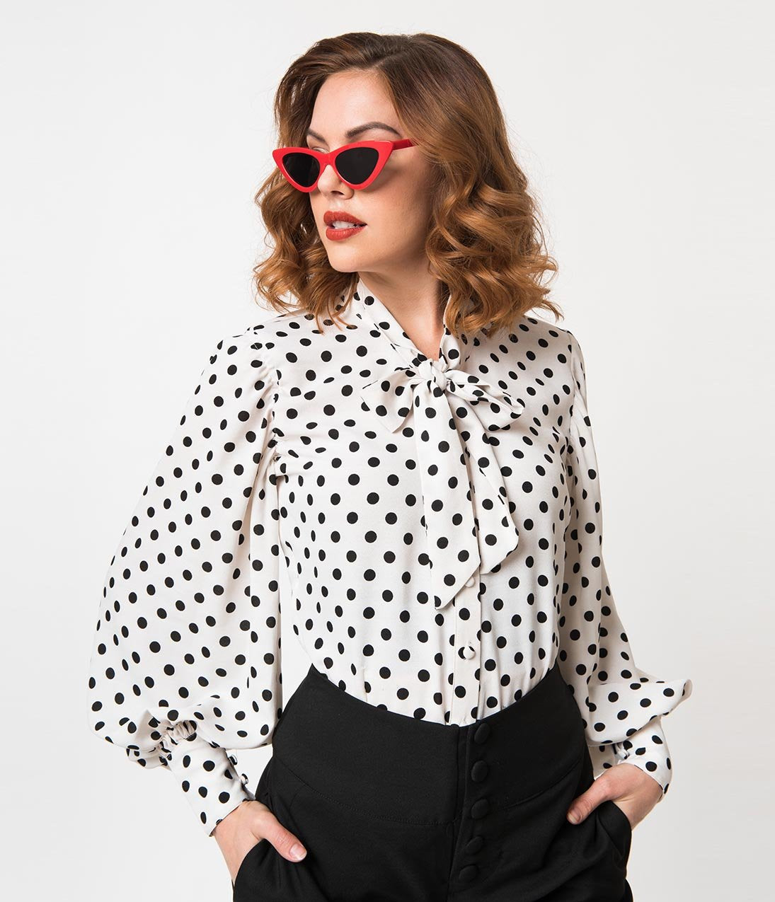 white blouse with black polka dots