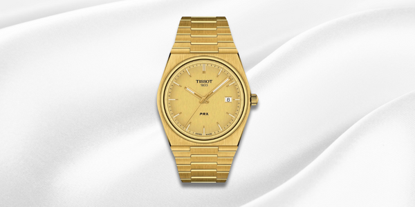 Tissot PRX with PVD in yellow gold