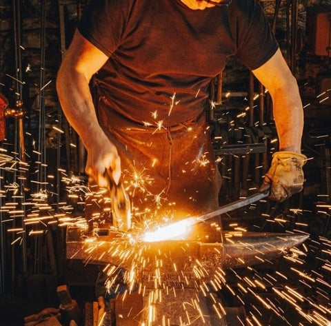 Forging metal - blacksmith