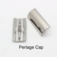 Perlage pattern under cap on titanium single edge safety razor cap